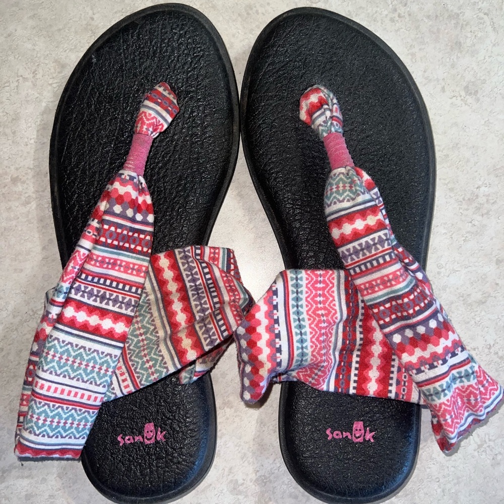 Sanuk Black and Red Sandals with Vibrant Fabric Straps